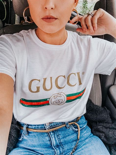 girl wearing gucci chirt|what do gucci men wear.